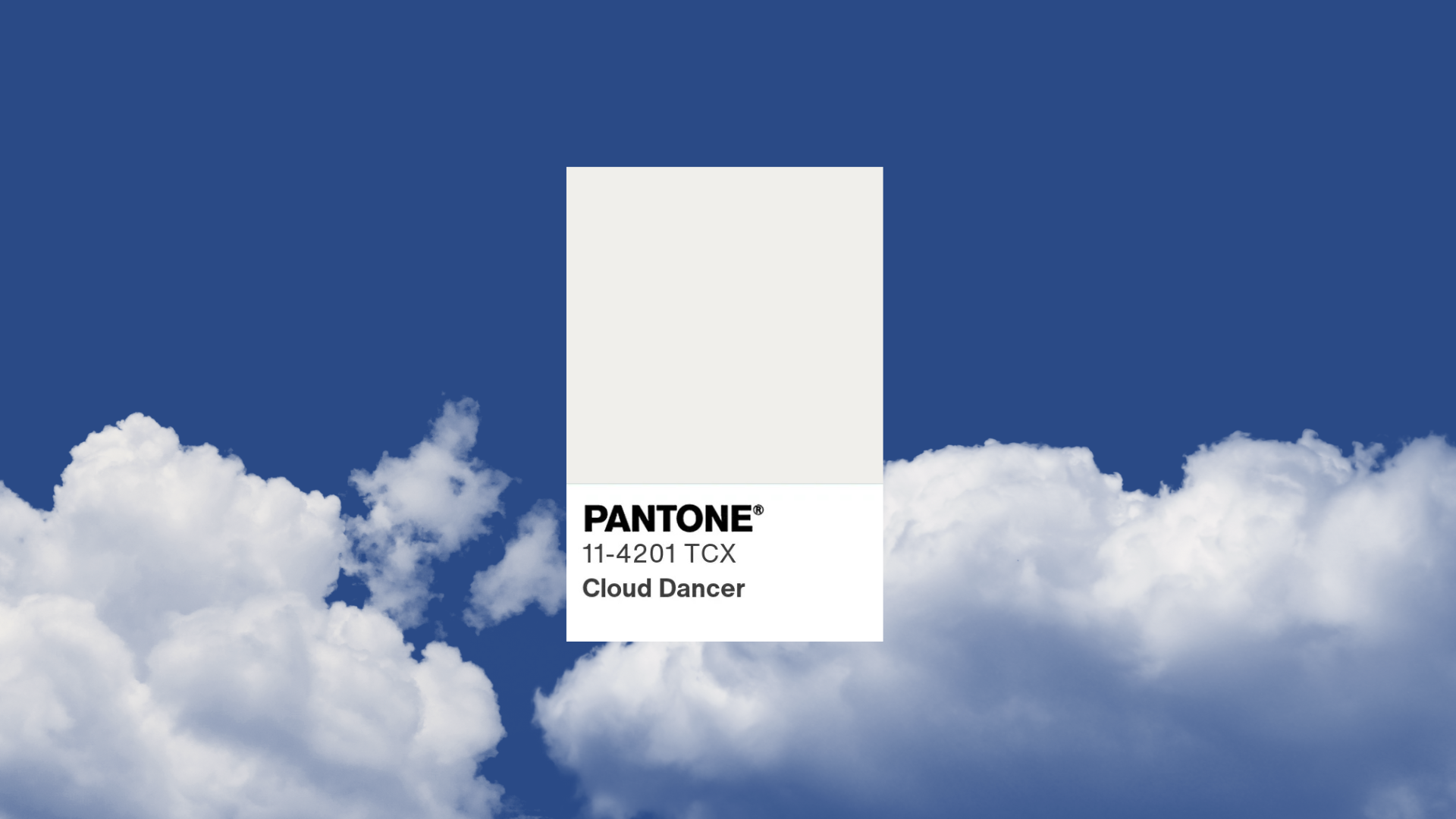pantone color of the year swatch cloud dancer on a blue sky background with clouds